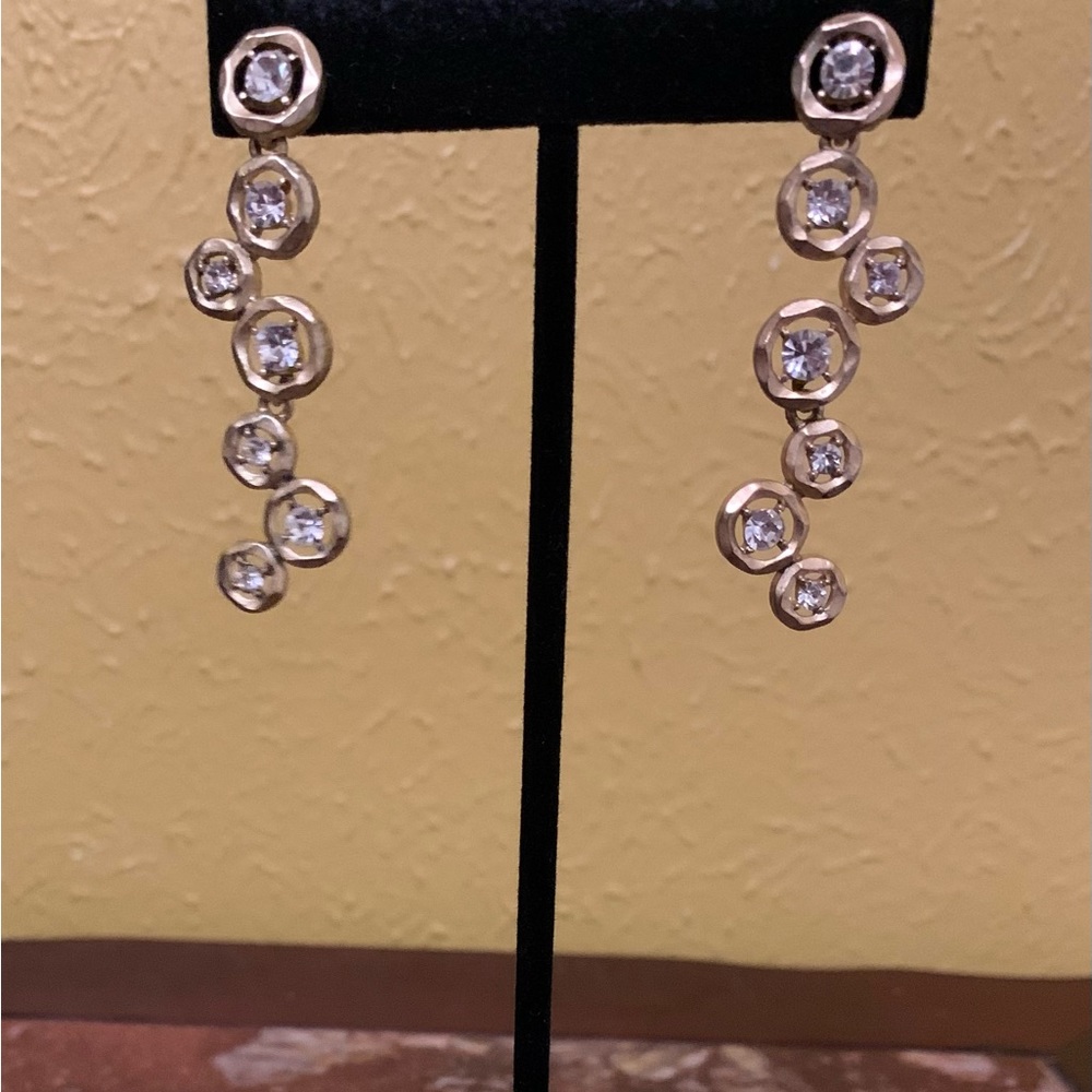 Gold dangling covered earrings